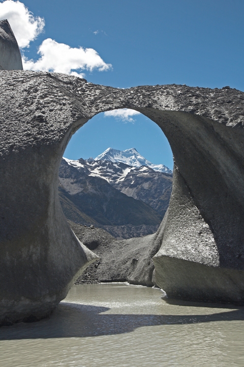 View to Aoraki Mount Cook through iceberg